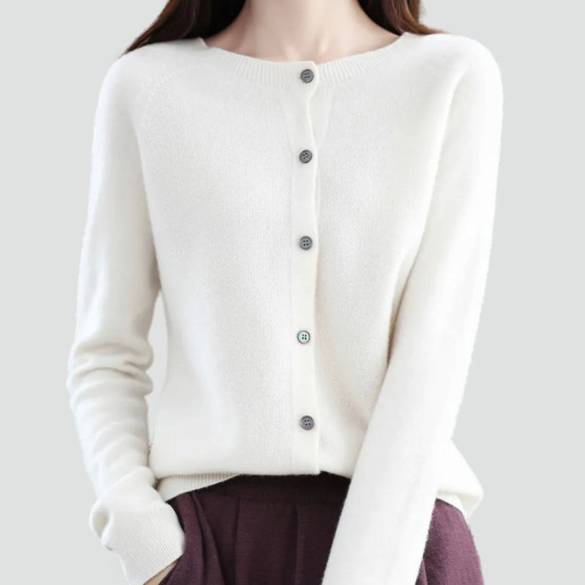 Women's plain knitted button-front cardigan with V-neckline and long sleeves