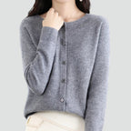 Women's plain knitted button-front cardigan with V-neckline and long sleeves