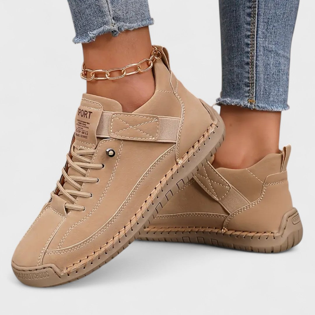 Women's lace-up casual sneakers with ankle strap, stitched panels and textured sole