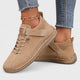 Women's lace-up casual sneakers with ankle strap, stitched panels and textured sole