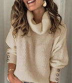Women's ribbed turtleneck pullover with button cuff details