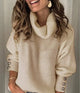 Women's ribbed turtleneck pullover with button cuff details
