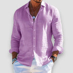 Men's long sleeve button-front shirt with open collar and curved hem