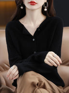 Women's plain button-front cardigan with round neck and long sleeves