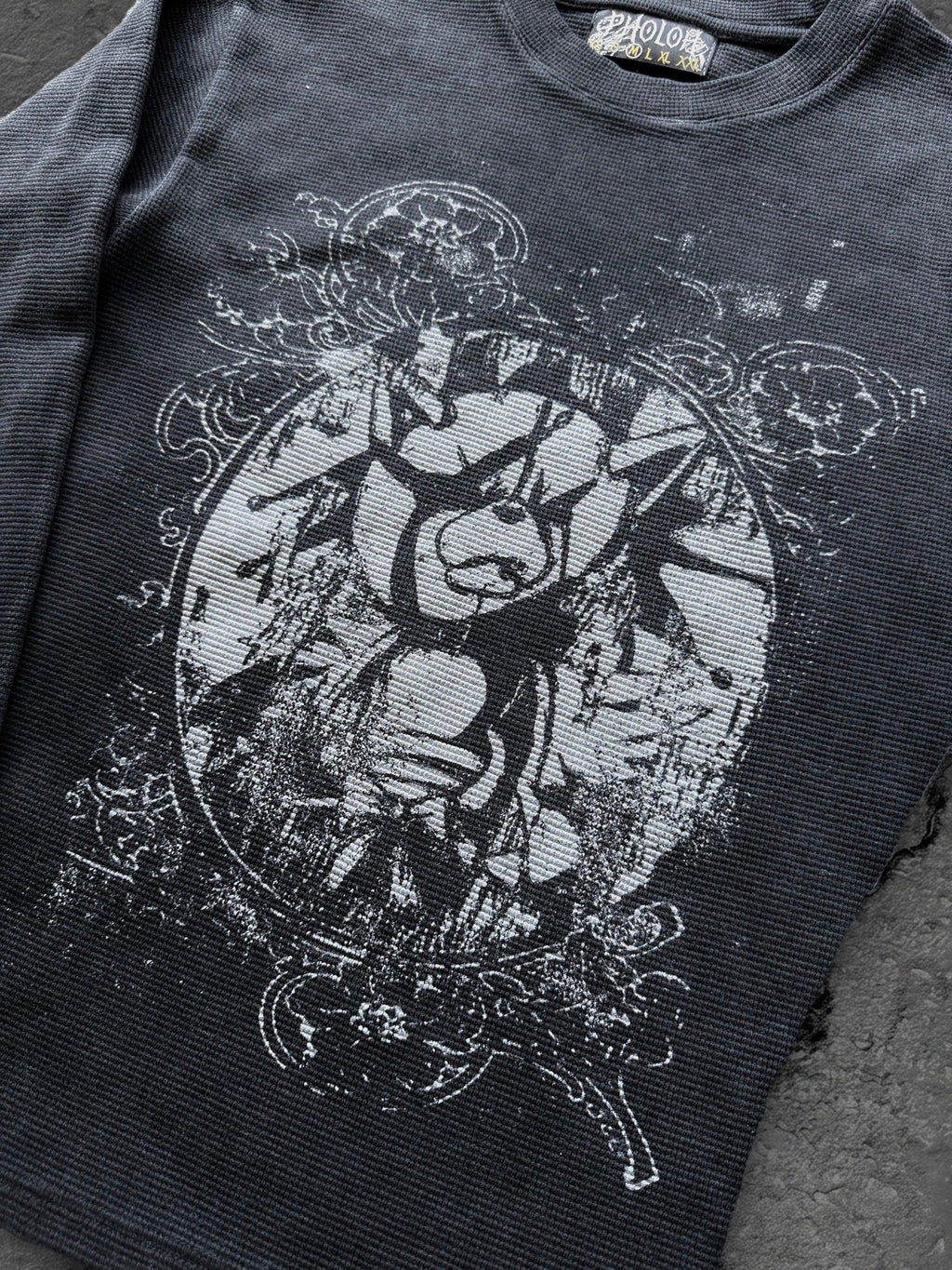 Women's black crewneck sweatshirt with monochrome graphic front print