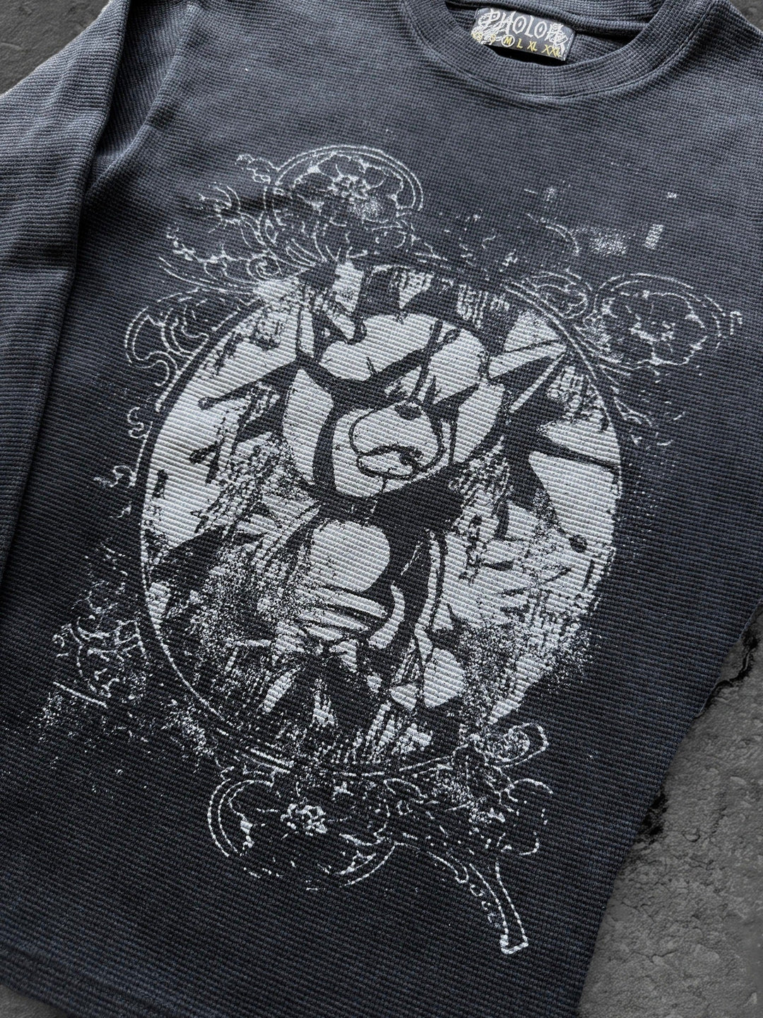 Women's black crewneck sweatshirt with monochrome graphic front print