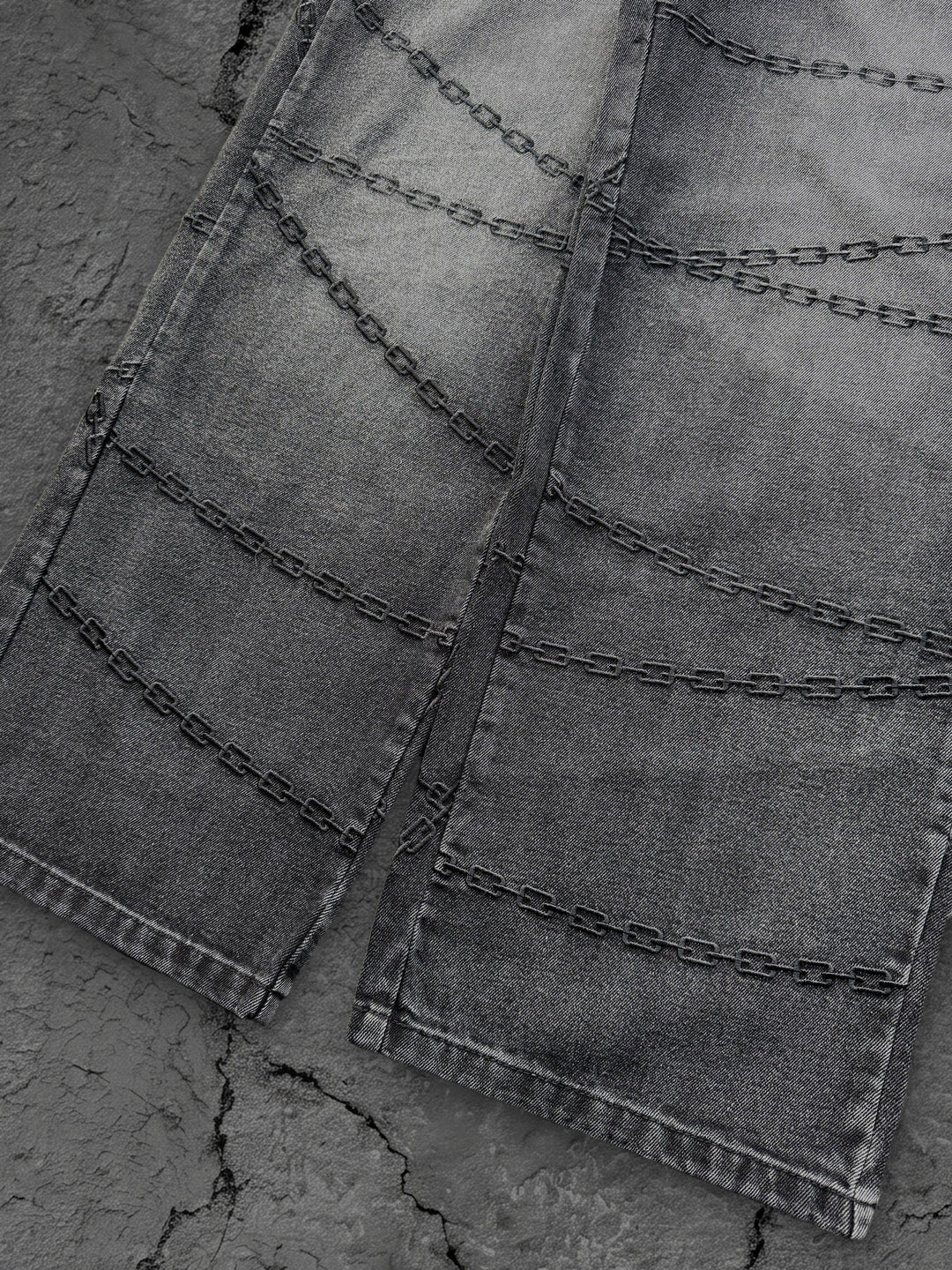 Men's gray denim shorts with chain graphics, belt loops and rear pockets