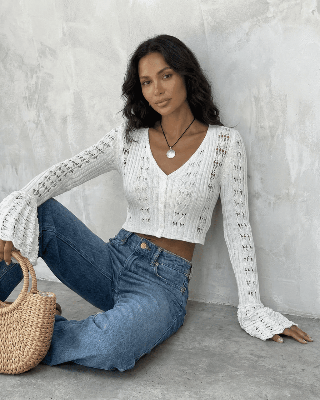 Women's white openwork cropped cardigan with V-neck and flared sleeves