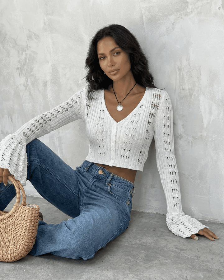 Women's white openwork cropped cardigan with V-neck and flared sleeves
