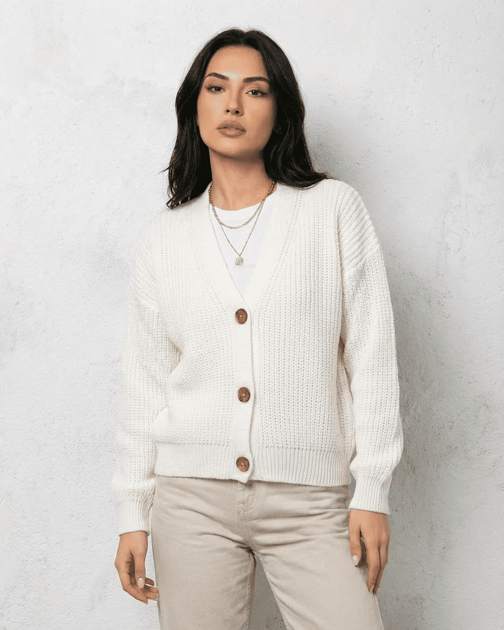 Women's white V-neck knit cardigan with button front