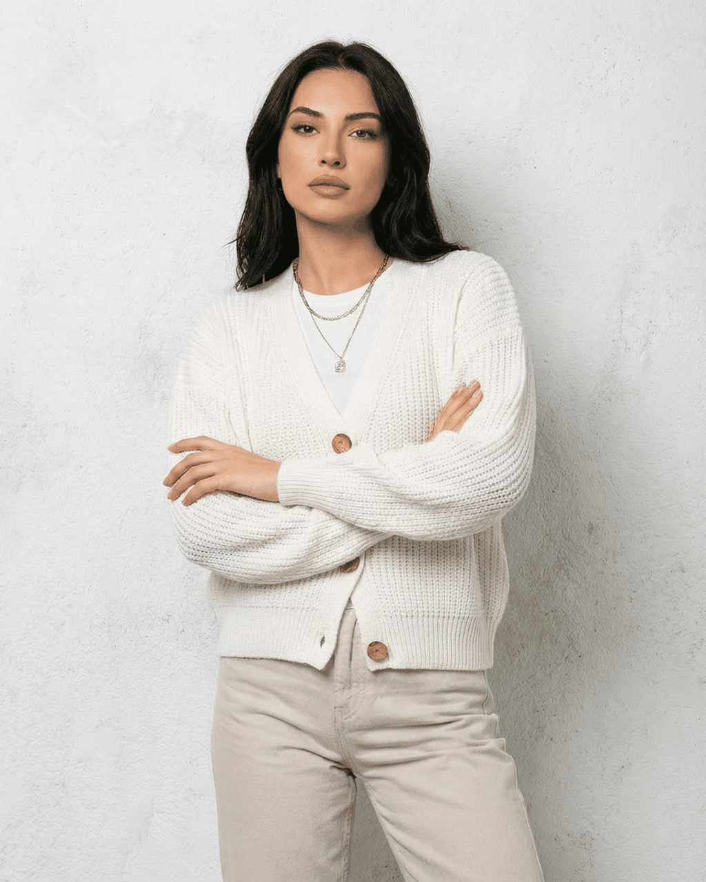 Women's white V-neck knit cardigan with button front