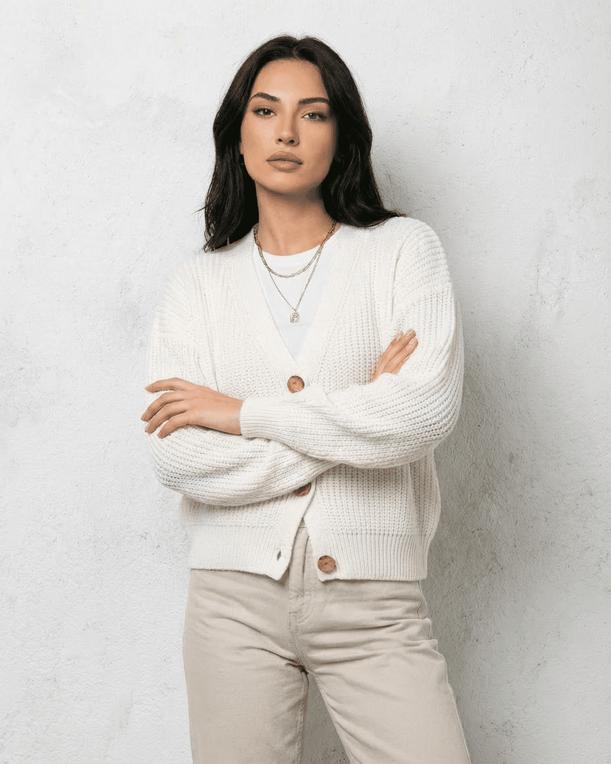 Women's white V-neck knit cardigan with button front