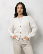 Women's white V-neck knit cardigan with button front