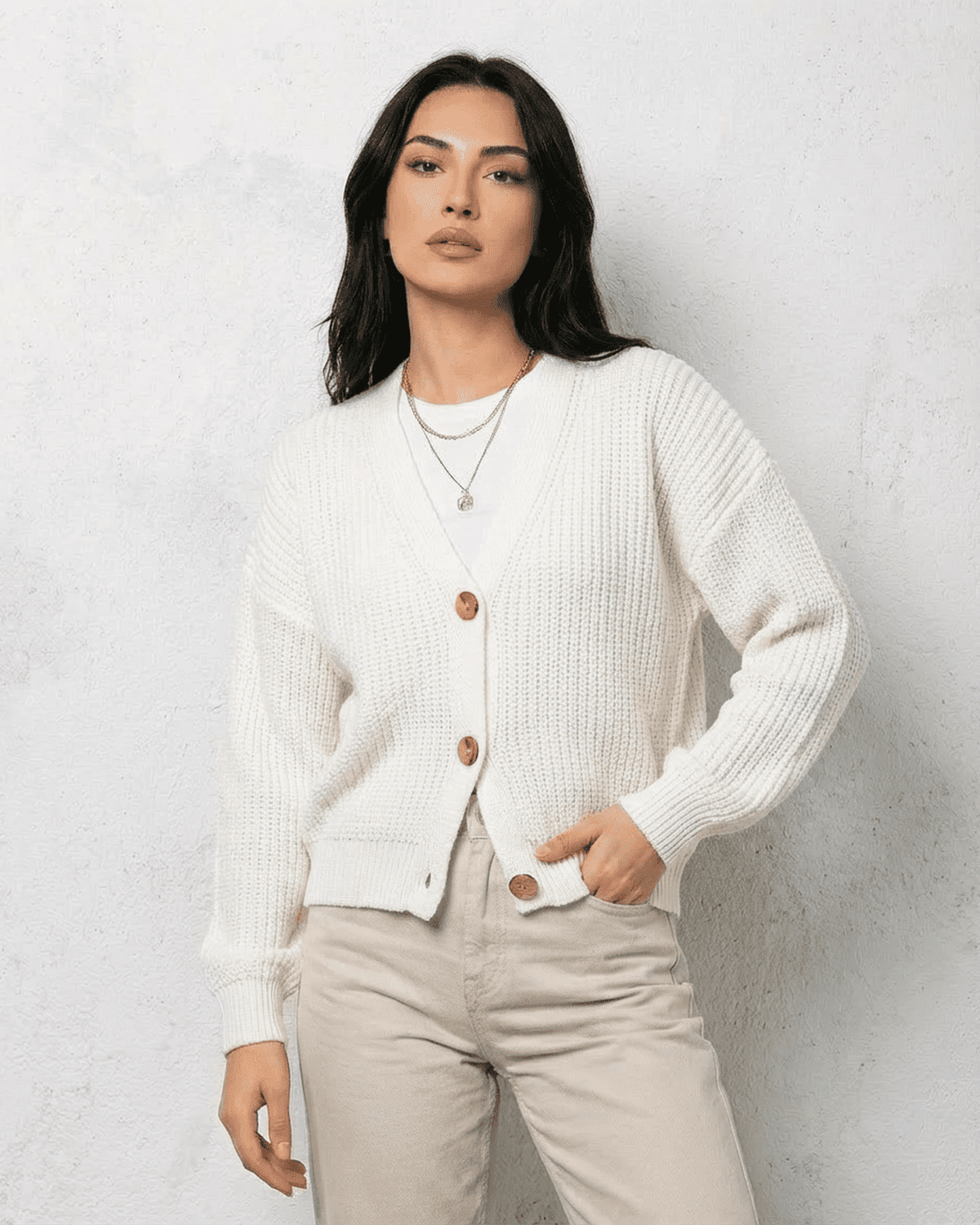 Women's white V-neck knit cardigan with button front