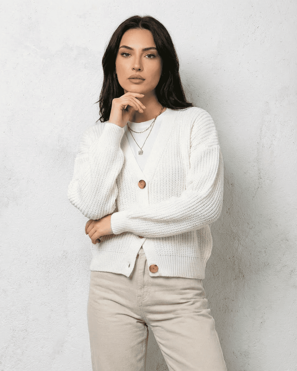 Women's white V-neck knit cardigan with button front