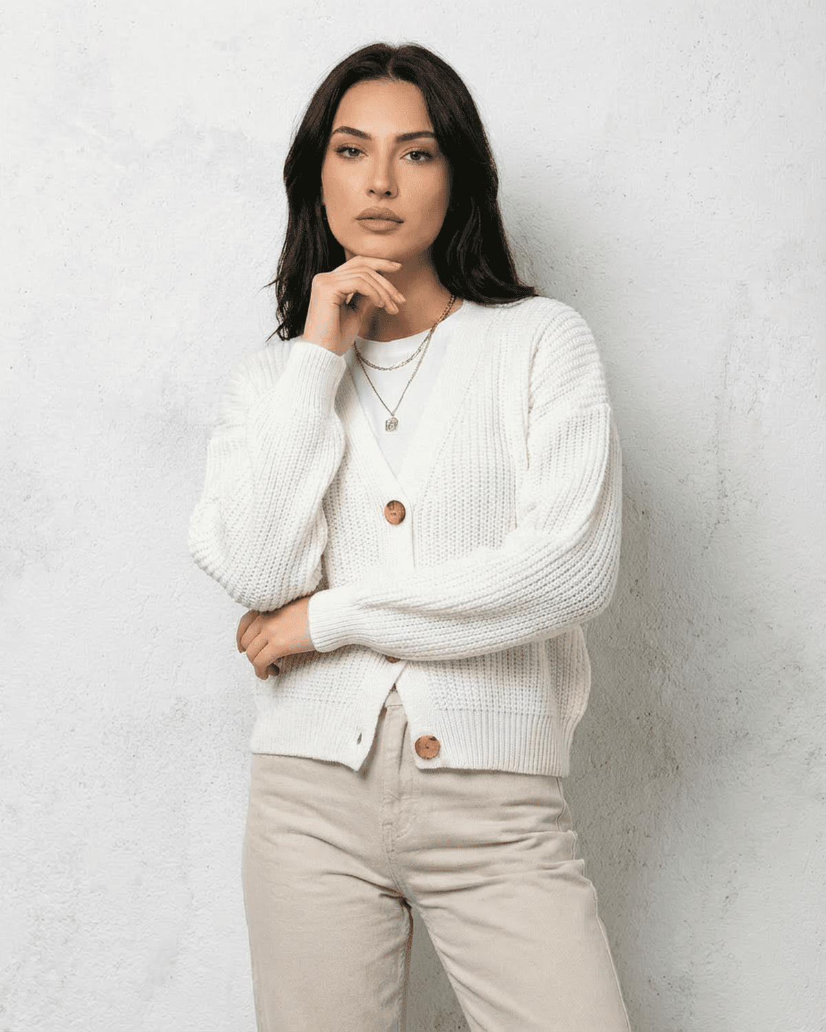 Women's white V-neck knit cardigan with button front