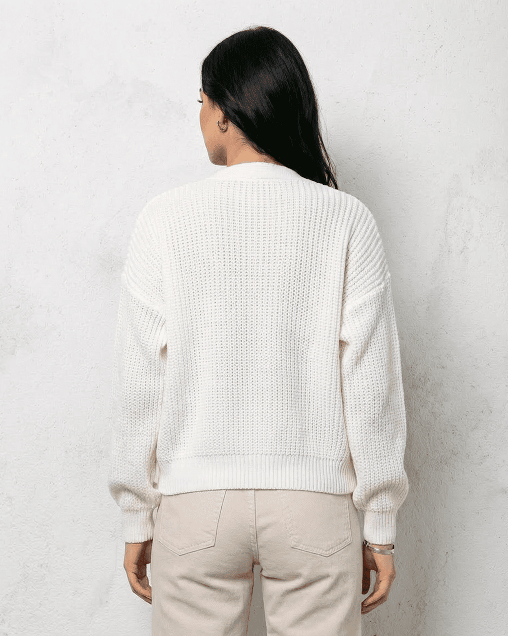 Women's white V-neck knit cardigan with button front