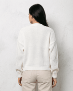 Women's white V-neck knit cardigan with button front