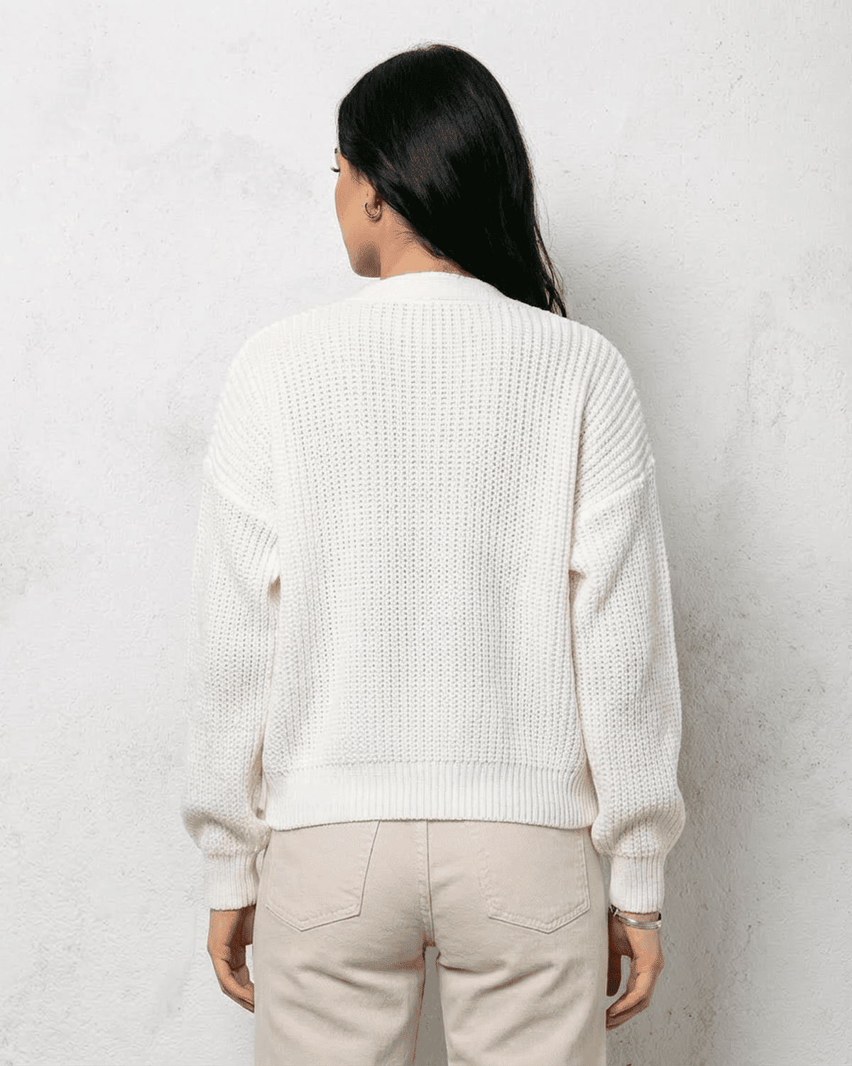 Women's white V-neck knit cardigan with button front