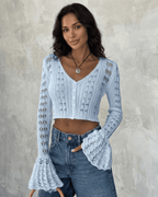 Women's pale blue cropped openwork cardigan with V-neck, buttons and flared cuffs