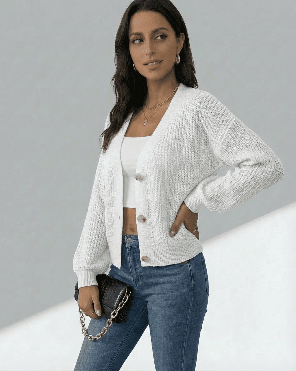 Women's white textured knit cardigan with long sleeves and button front