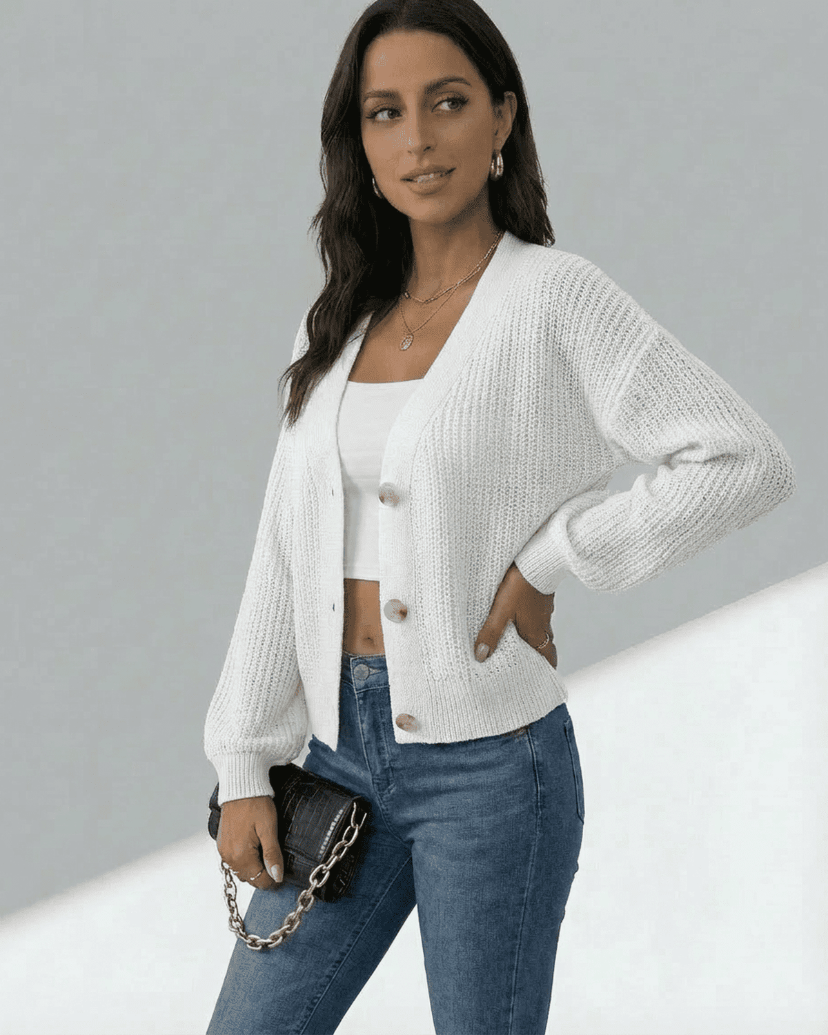 Women's white textured knit cardigan with long sleeves and button front