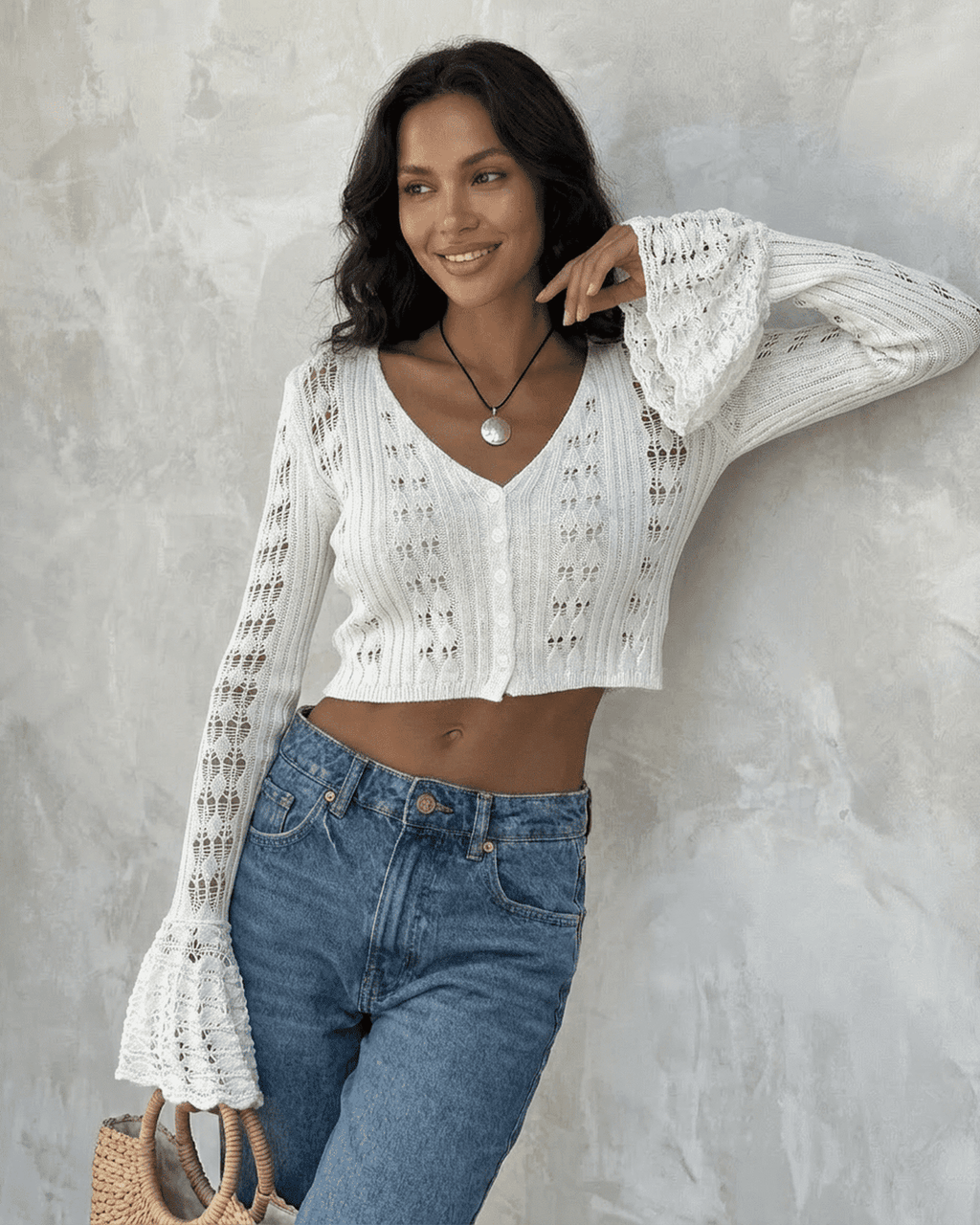 Women's white openwork cropped cardigan with V-neck and flared sleeves