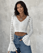 Women's white openwork cropped cardigan with V-neck and flared sleeves