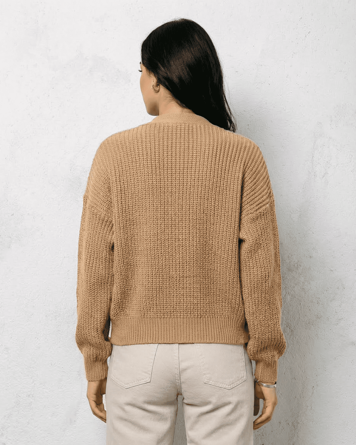 Women's textured V-neck cardigan with pearl-style trim and buttons