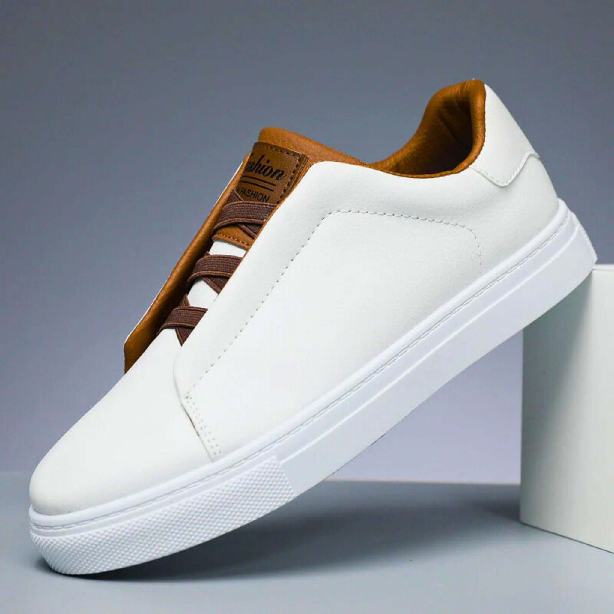 Unisex low-top panelled sneakers with lace-up front and flat sole