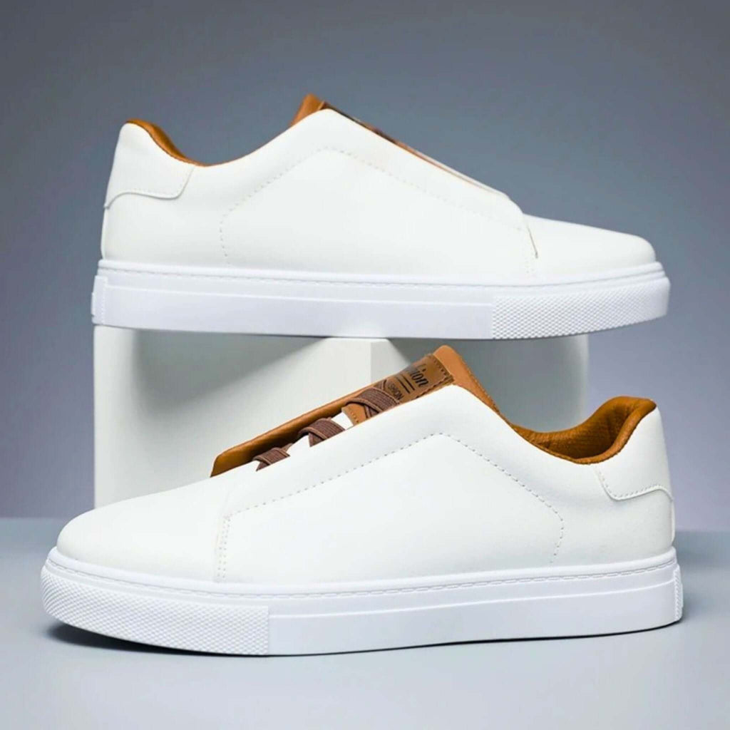 Unisex low-top panelled sneakers with lace-up front and flat sole