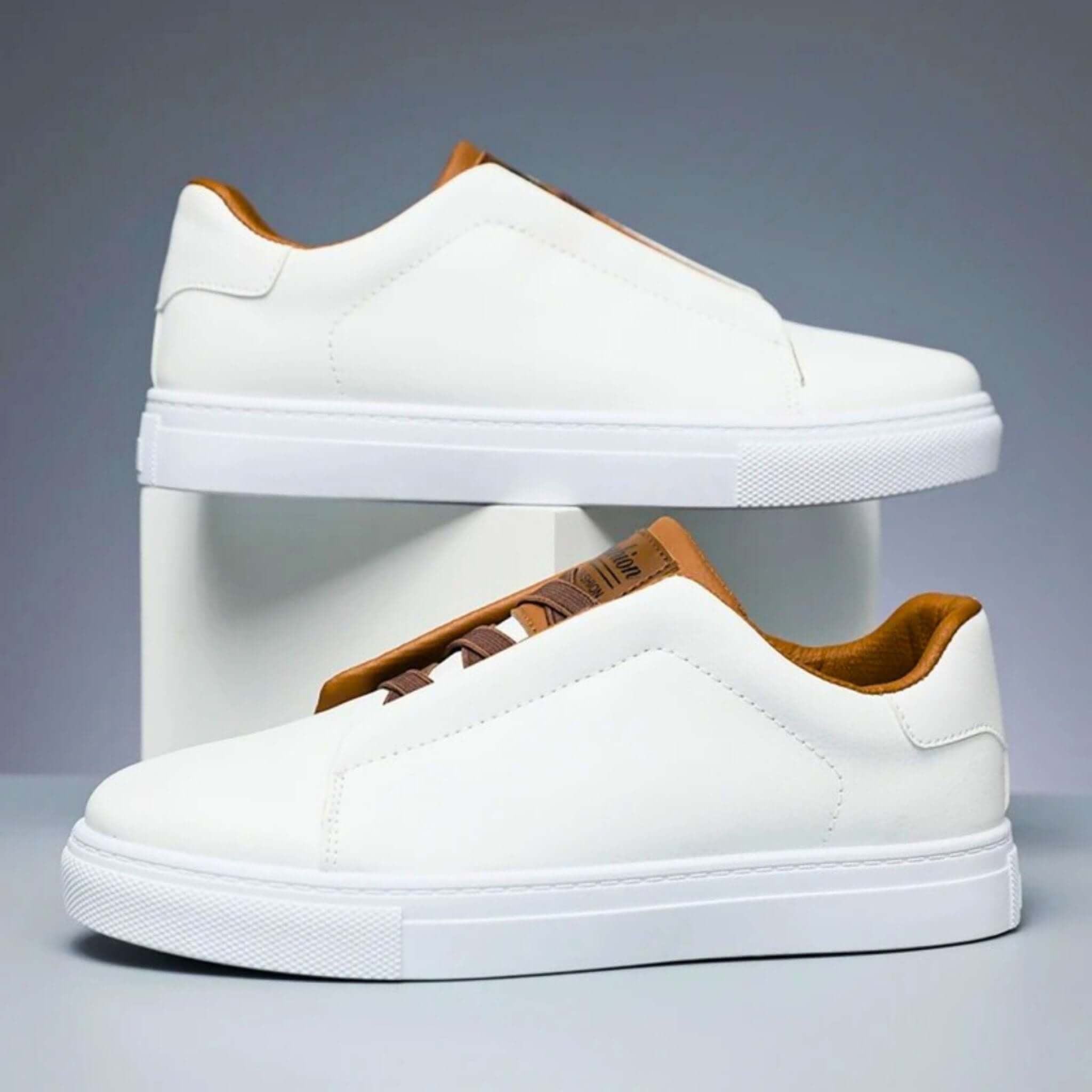 Unisex low-top panelled sneakers with lace-up front and flat sole
