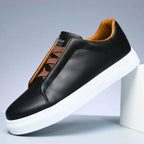 Unisex low-top panelled sneakers with lace-up front and flat sole