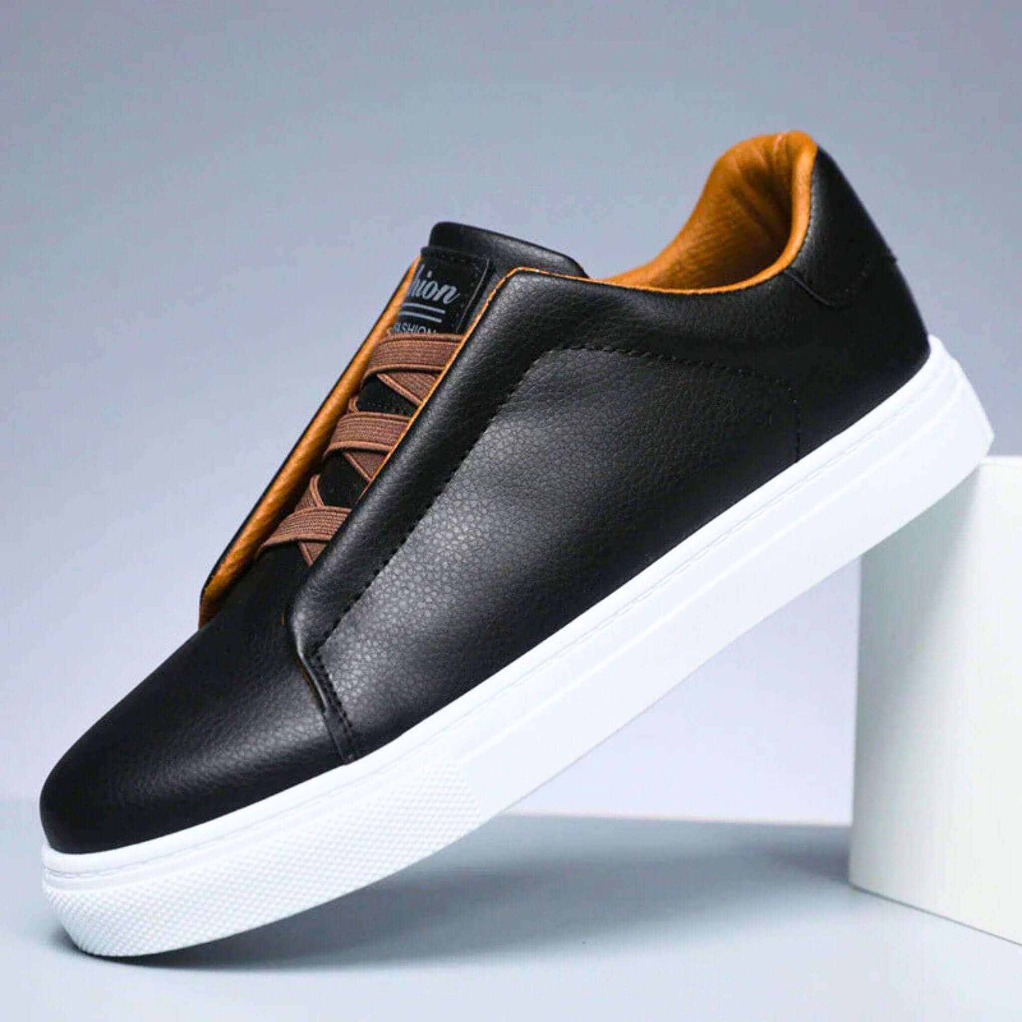 Unisex low-top panelled sneakers with lace-up front and flat sole