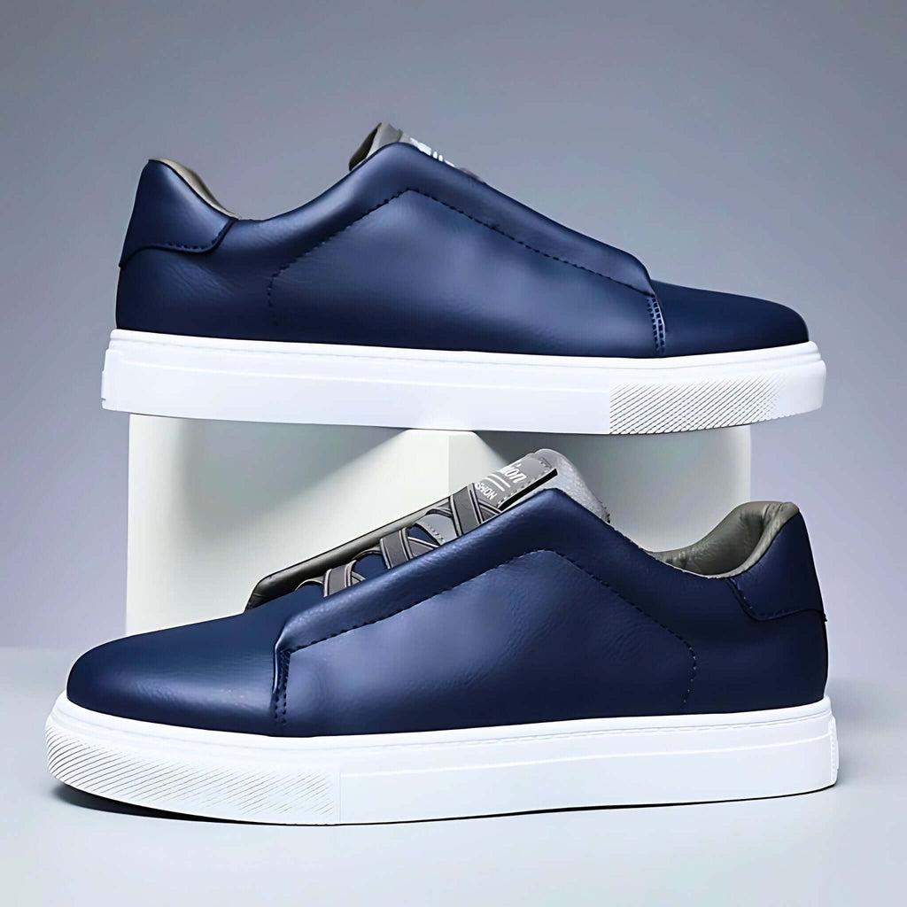 Unisex low-top panelled sneakers with lace-up front and flat sole