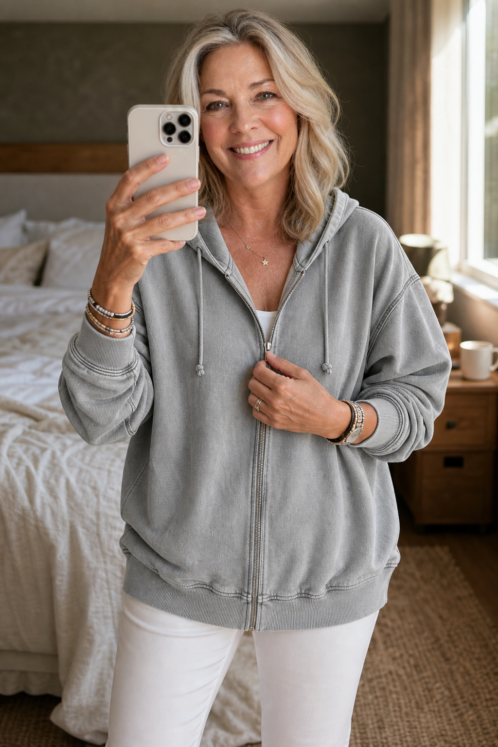 Women's relaxed washed zip-up hoodie with drawstring hood and front pockets