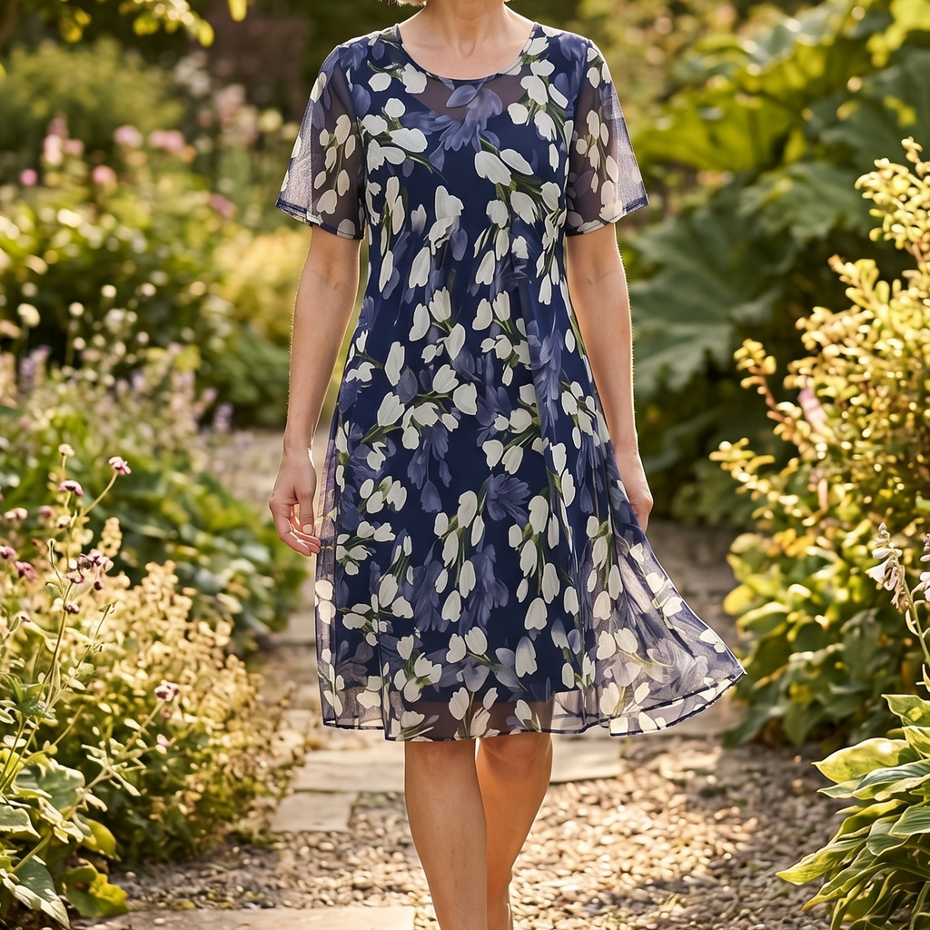 Women's navy floral A-line midi dress with round neckline and short sleeves