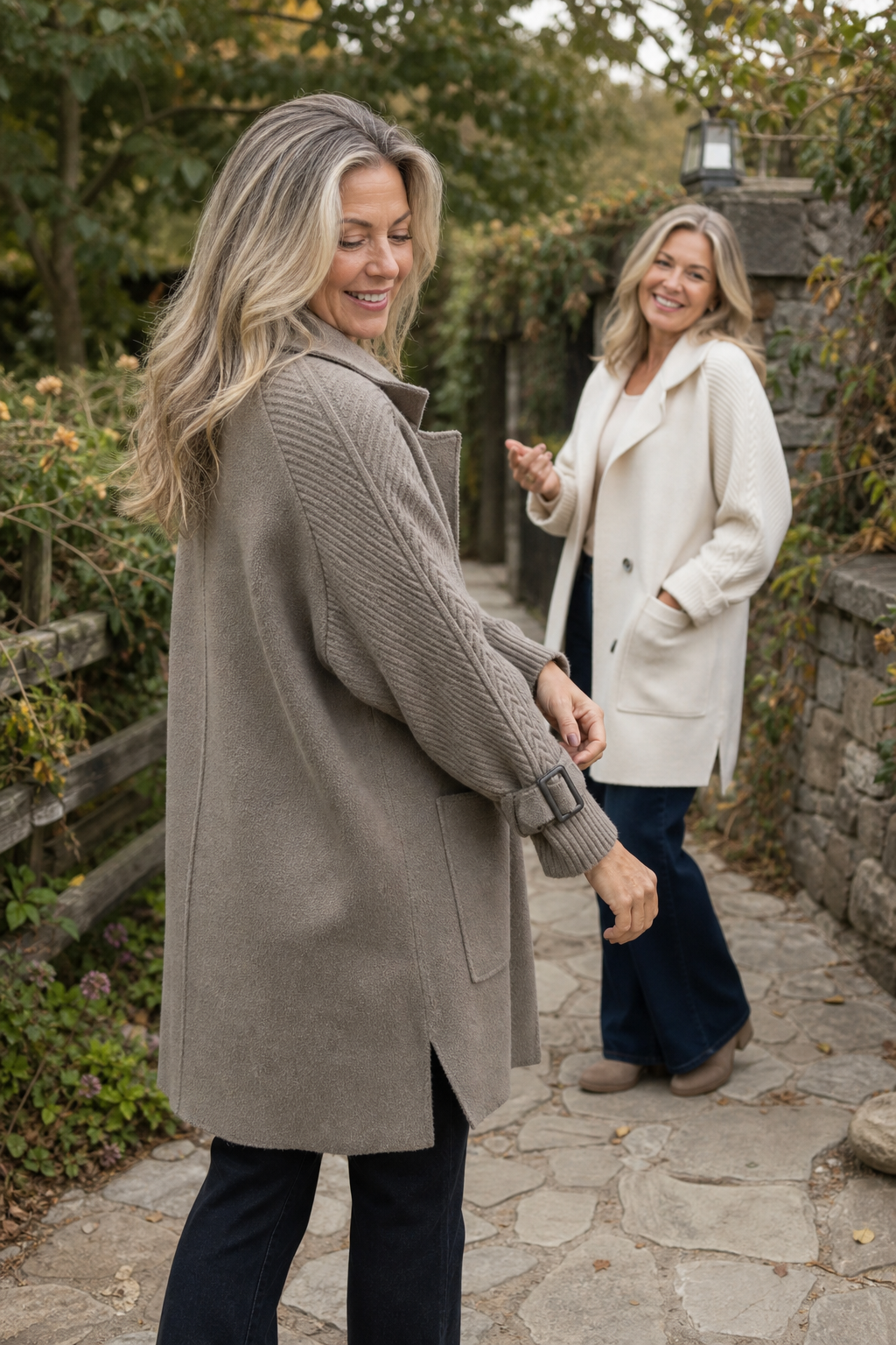 Women's longline double-breasted coat with knitted sleeves and buckle cuffs