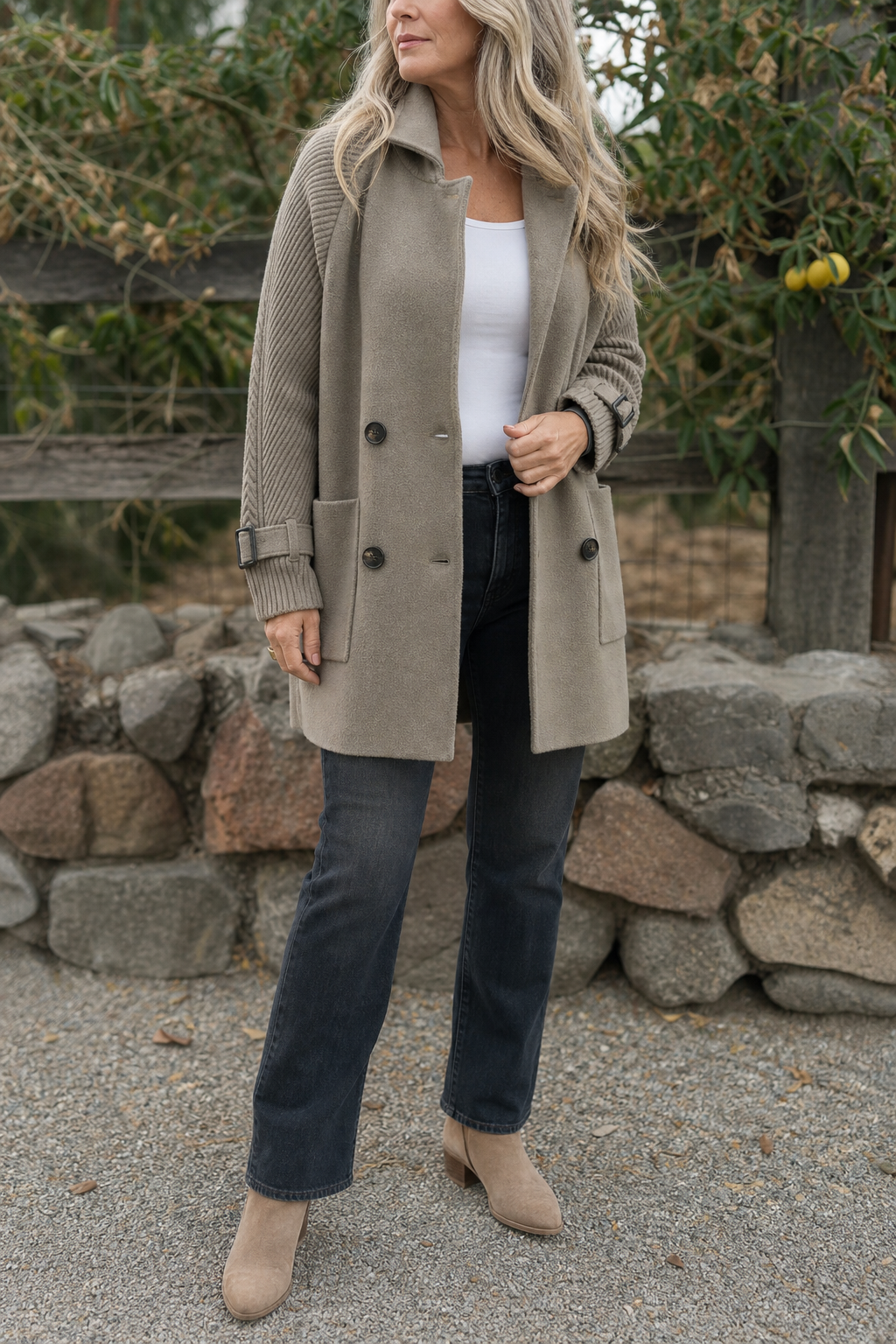 Women's longline double-breasted coat with knitted sleeves and buckle cuffs