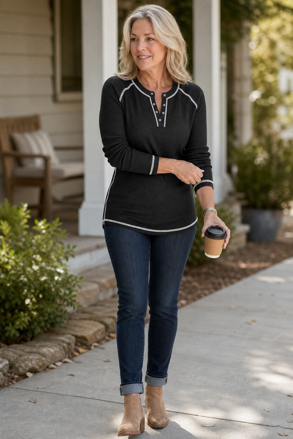 Women's long-sleeve waffle knit Henley top with contrast stitching and button placket