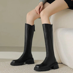 Women's tall boots with round toes, side zips and chunky lug soles