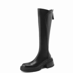 Women's tall boots with round toes, side zips and chunky lug soles