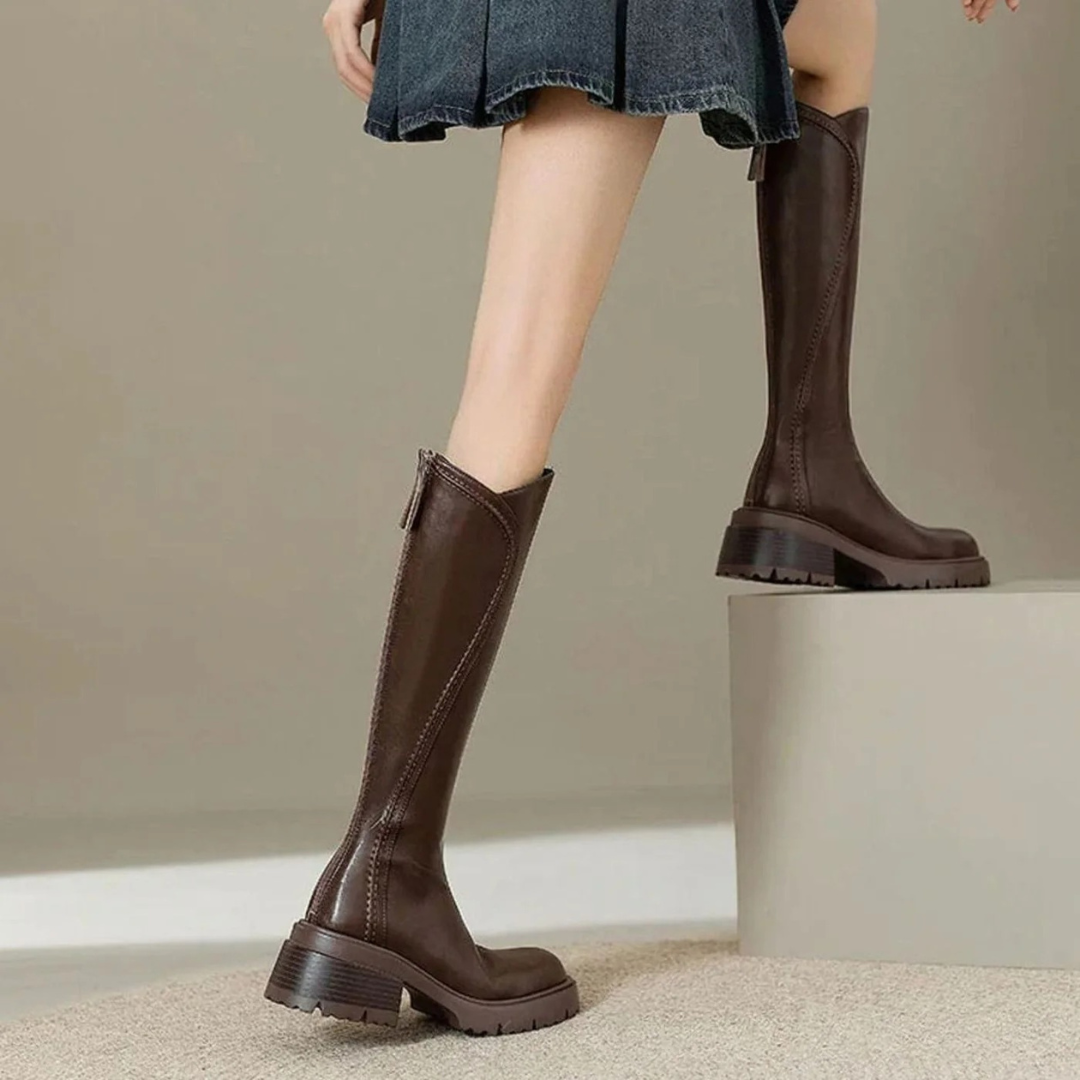 Women's tall boots with round toes, side zips and chunky lug soles