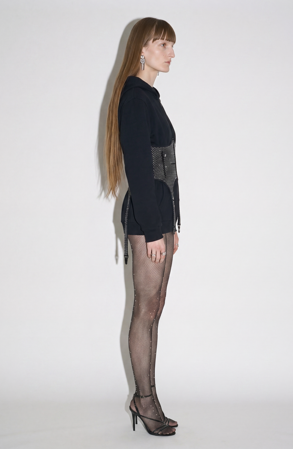 Black hooded zip hoodie with a crystal-studded corset panel