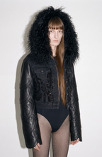 Black cropped jacket with textured collar, long sleeves and front embellishment