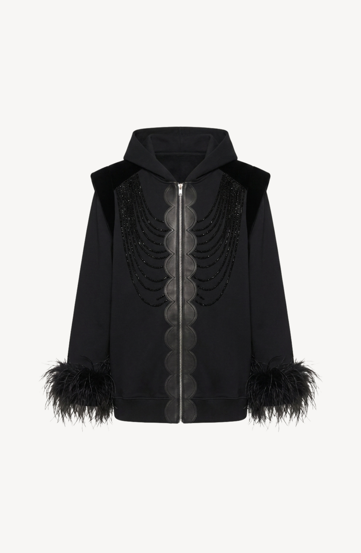 Women's black zip hoodie with embellished front and feather-trimmed cuffs