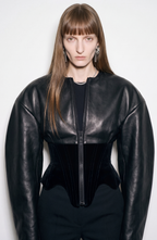 Women's black cropped corset jacket with long sleeves and front zip