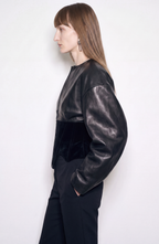 Women's black cropped corset jacket with long sleeves and front zip