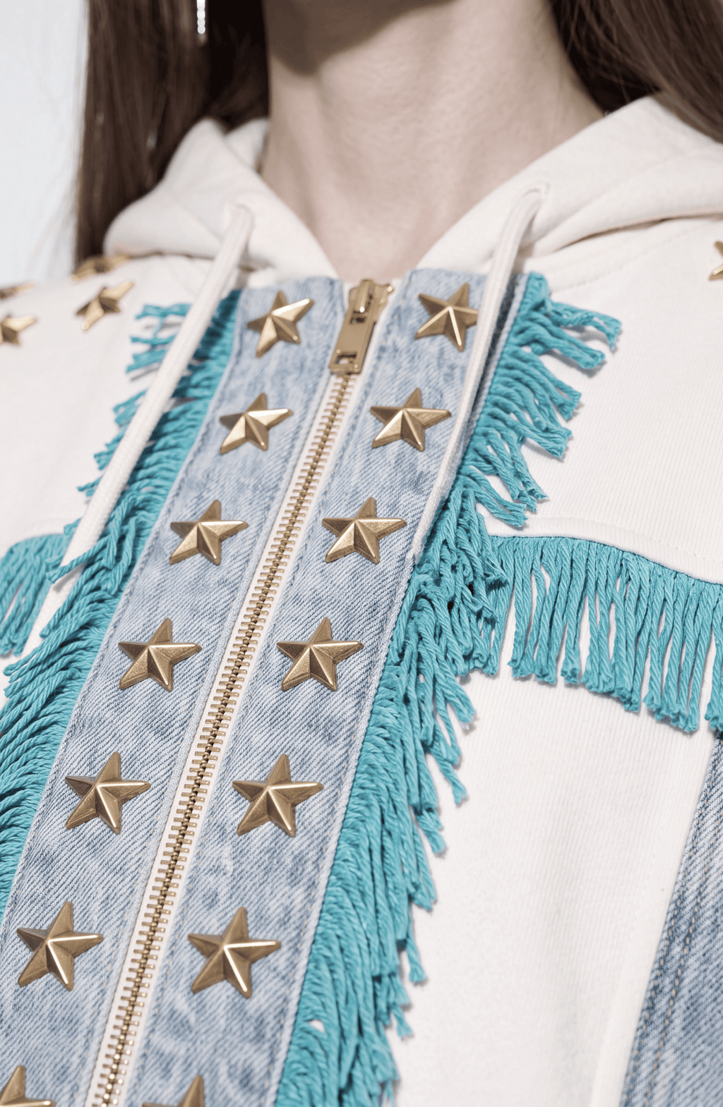 Women's white hooded zip hoodie with star embellishments and turquoise fringe