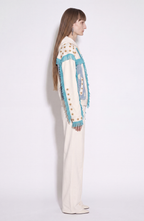 Women's white hooded zip hoodie with star embellishments and turquoise fringe